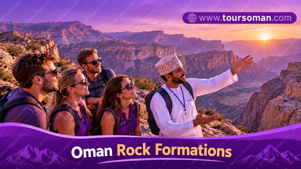 Hiker overlooking layered rocky mountains and canyon cliffs in Oman